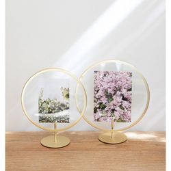 Marco de fotos, 26 x 10 x 26/30 cm, de hierro y vidrio en dorado | Colección Infinity